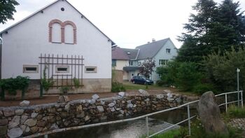 Sanierung Hochwasserschutzmauer in Großharthau